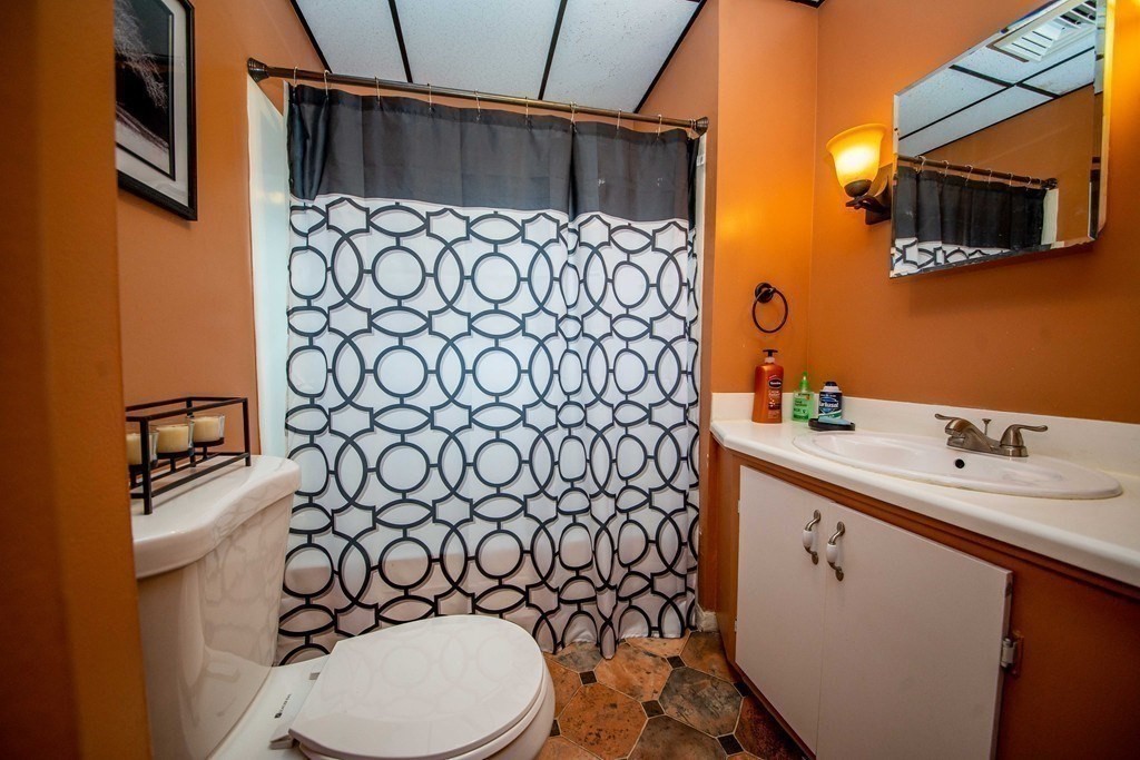 328 Broadway Fall River, MA 02721 - Photo 17 of 29 a bathroom with a sink toilet and shower