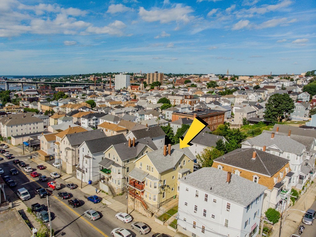 328 Broadway Fall River, MA 02721 - Photo 4 of 29 an aerial view of residential building with parking space
