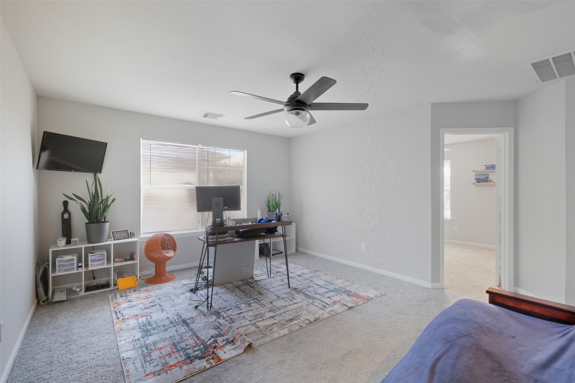 2934 Valiant Scene Court Houston, TX 77038 - Photo 18 of 28 a workspace with furniture and window