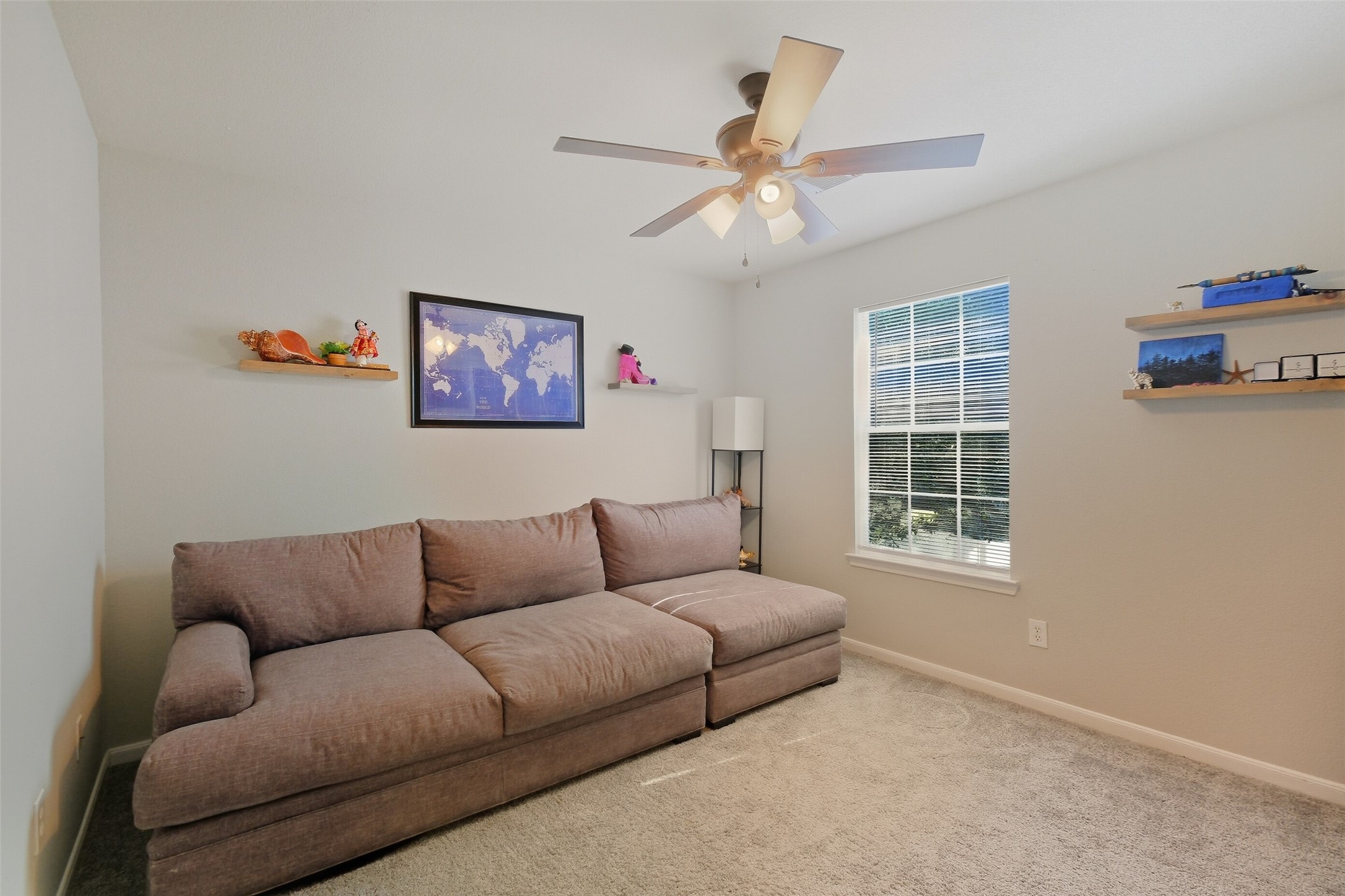 2934 Valiant Scene Court Houston, TX 77038 - Photo 19 of 28 a living room with furniture and windows