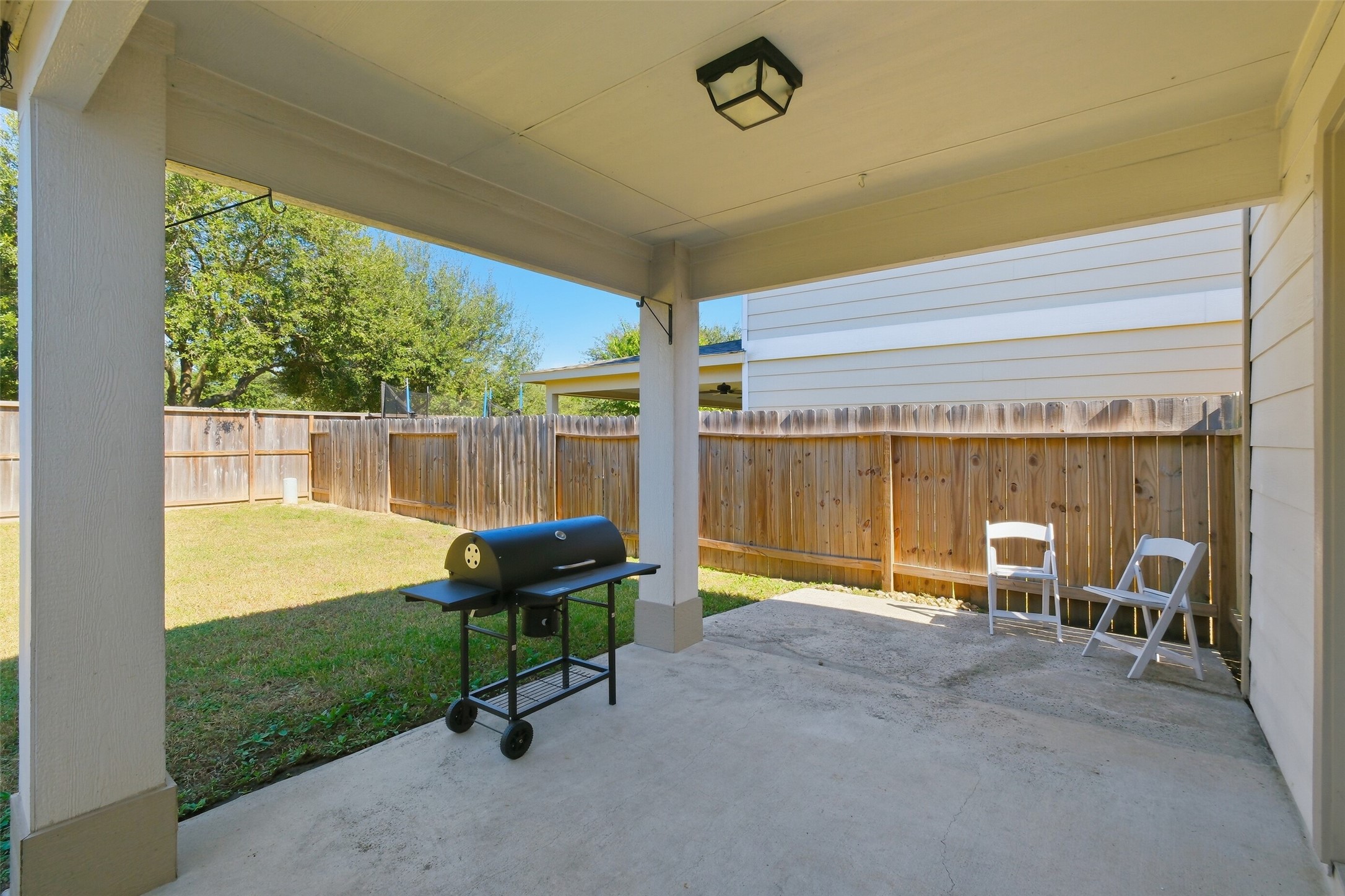 2934 Valiant Scene Court Houston, TX 77038 - Photo 24 of 28 a garden view with a seating space