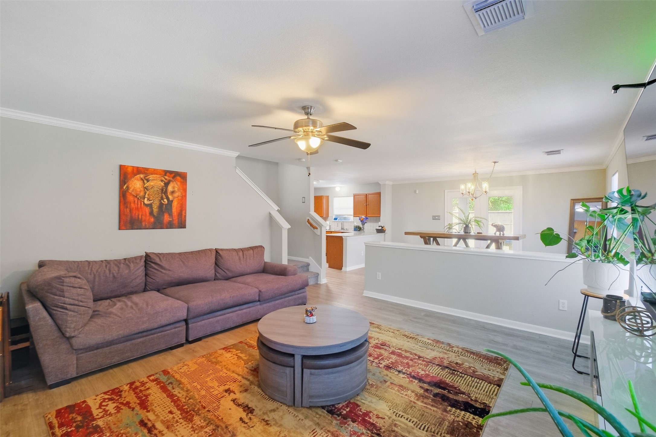2934 Valiant Scene Court Houston, TX 77038 - Photo 4 of 28 a living room with furniture and a chandelier