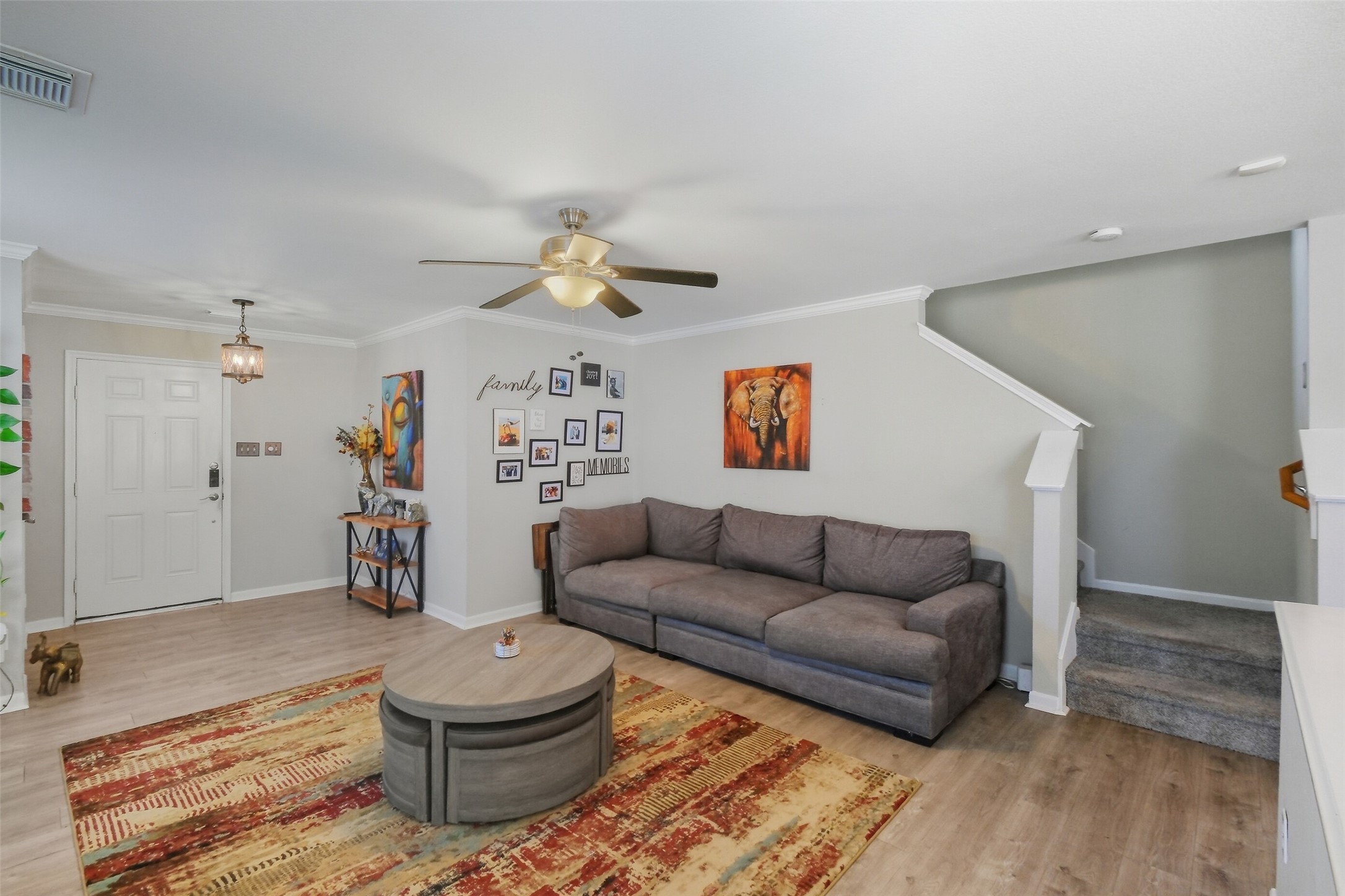 2934 Valiant Scene Court Houston, TX 77038 - Photo 6 of 28 a living room with furniture and a rug