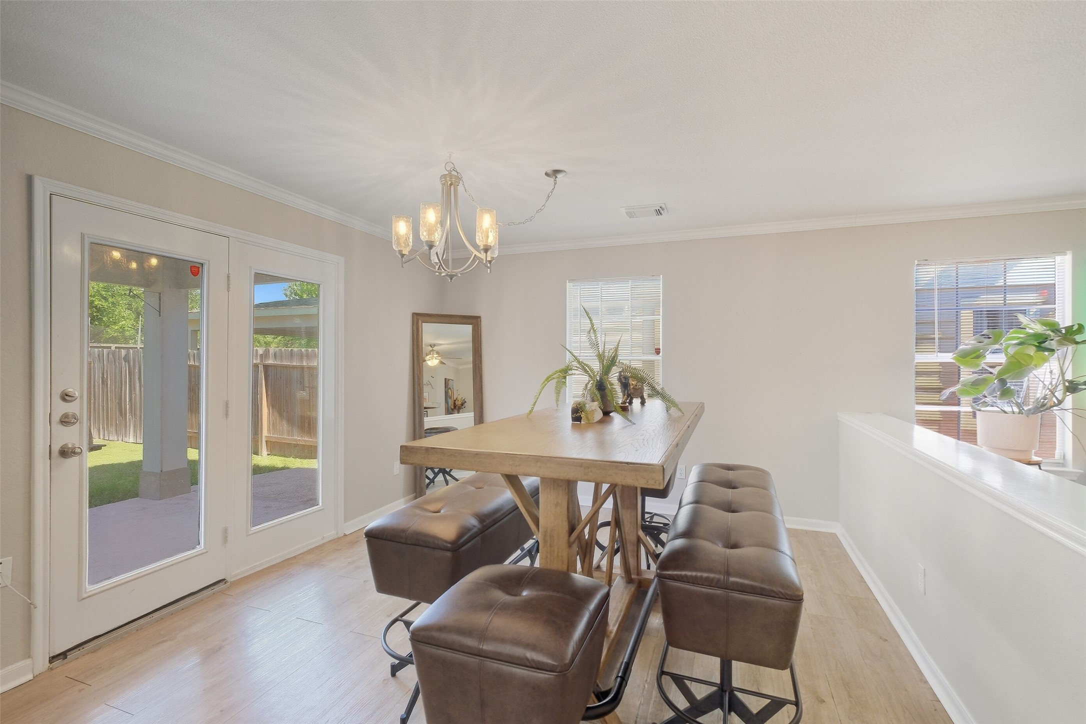 2934 Valiant Scene Court Houston, TX 77038 - Photo 7 of 28 a view of a dining room with furniture and a potted plant