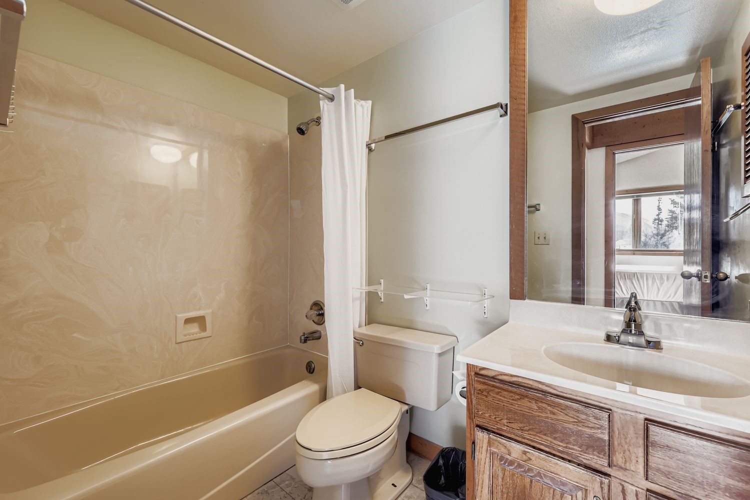 93 Fuller Placer Road, Unit F Breckenridge, CO 80424 - Photo 20 of 26 a bathroom with a sink toilet and shower