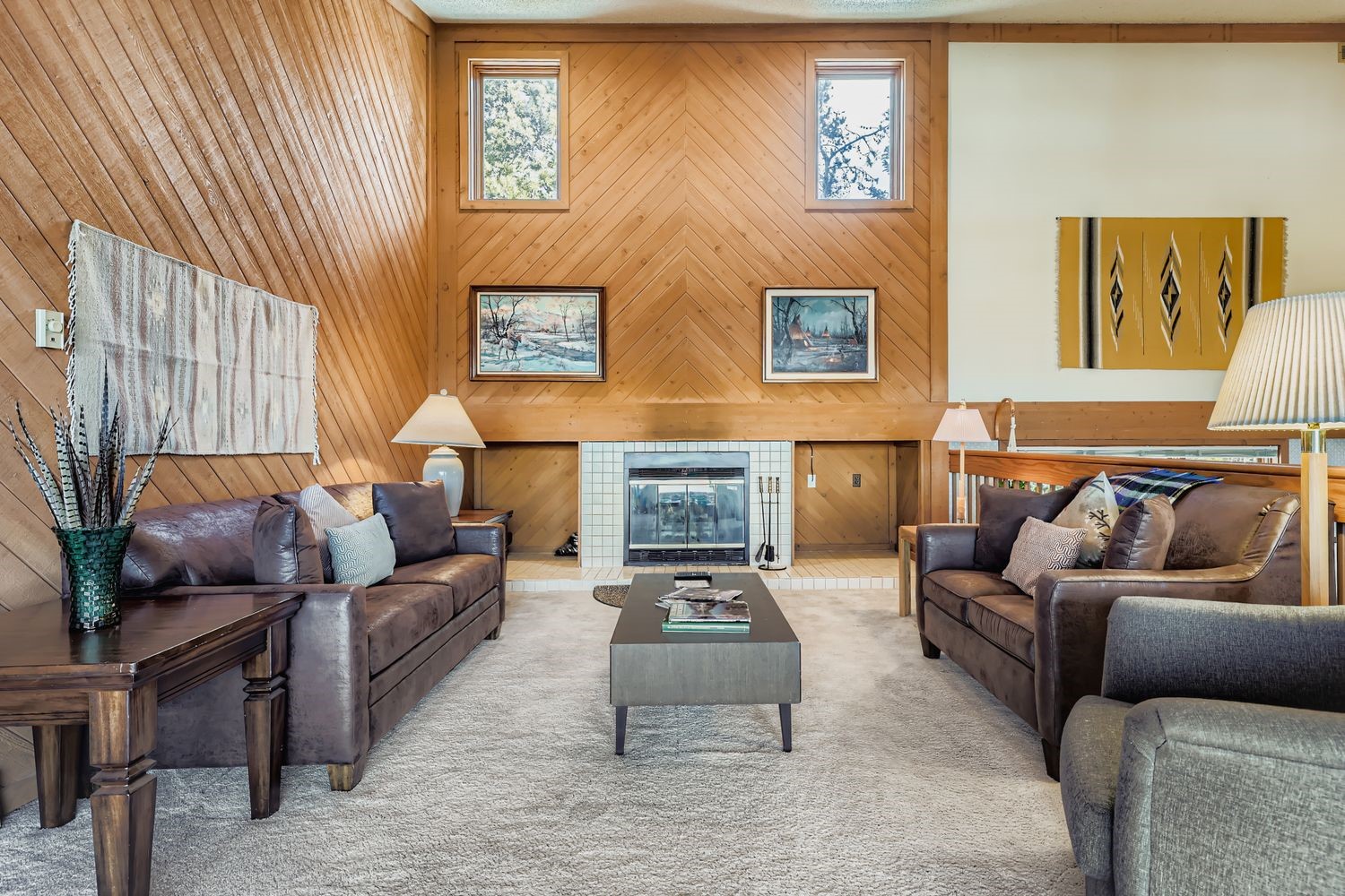 93 Fuller Placer Road, Unit F Breckenridge, CO 80424 - Photo 4 of 26 a living room with furniture and a fireplace