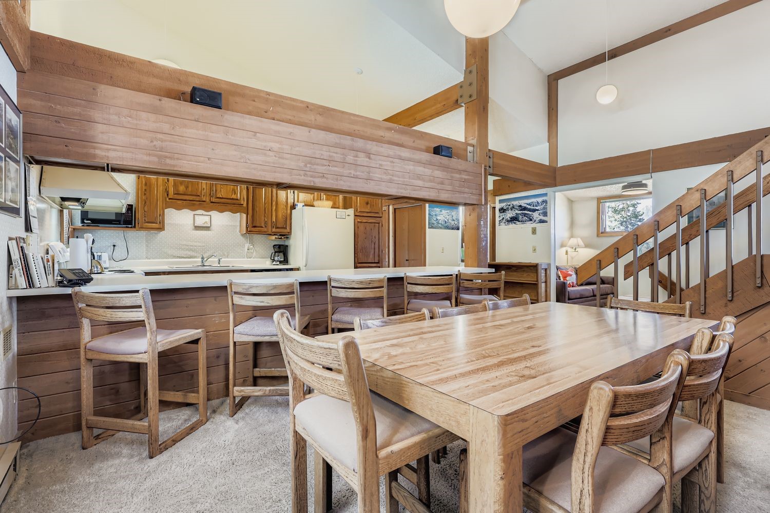 93 Fuller Placer Road, Unit F Breckenridge, CO 80424 - Photo 7 of 26 a dinning table and chairs in a kitchen