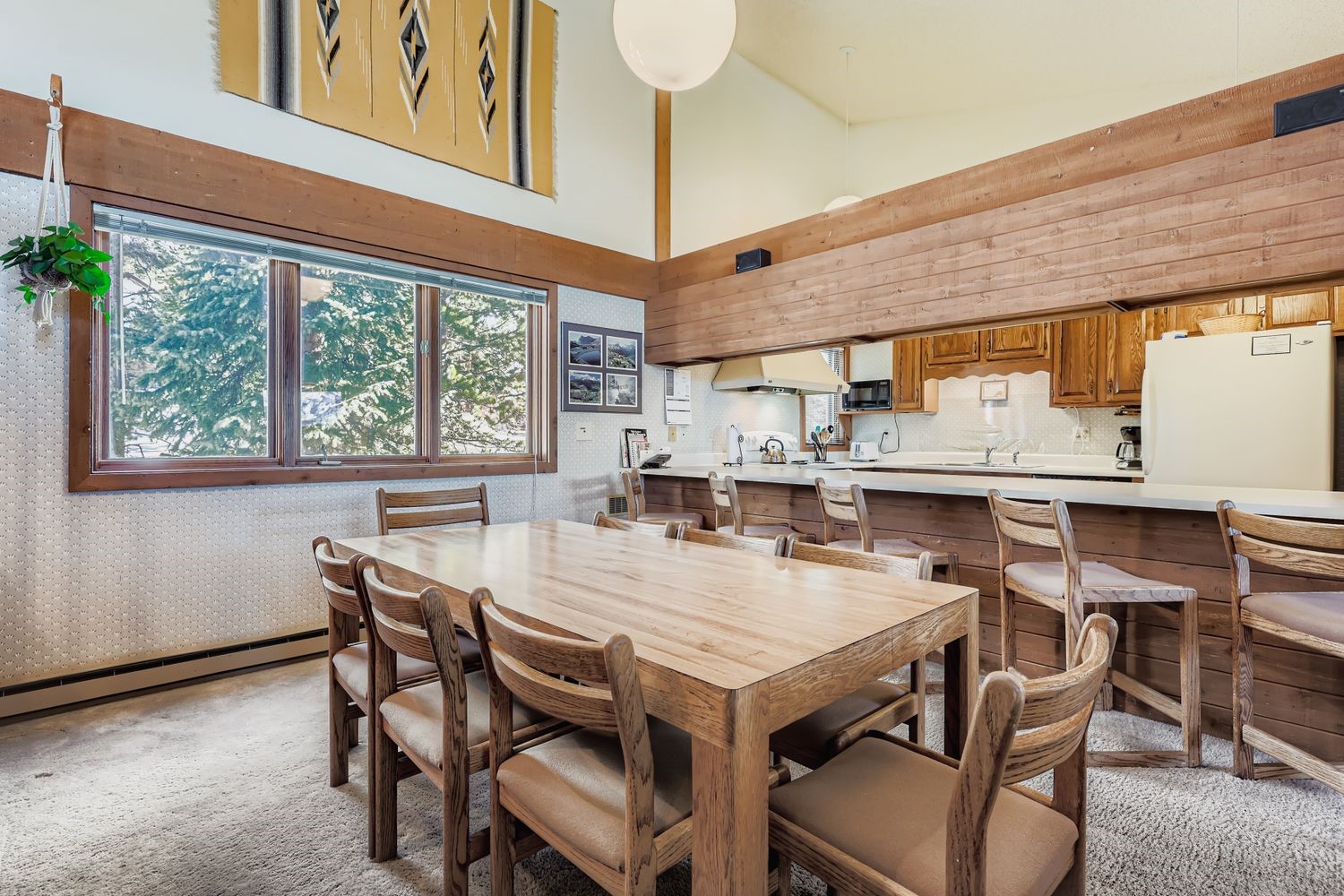 93 Fuller Placer Road, Unit F Breckenridge, CO 80424 - Photo 8 of 26 a view of a dining room with furniture window and outside view
