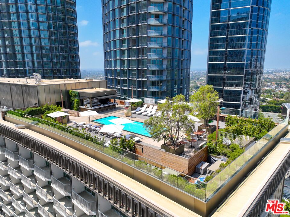 2025 Avenue Of The Stars, Unit 1202 Los Angeles, CA 90067 - Photo 15 of 20 a view of a garden with an outdoor seating