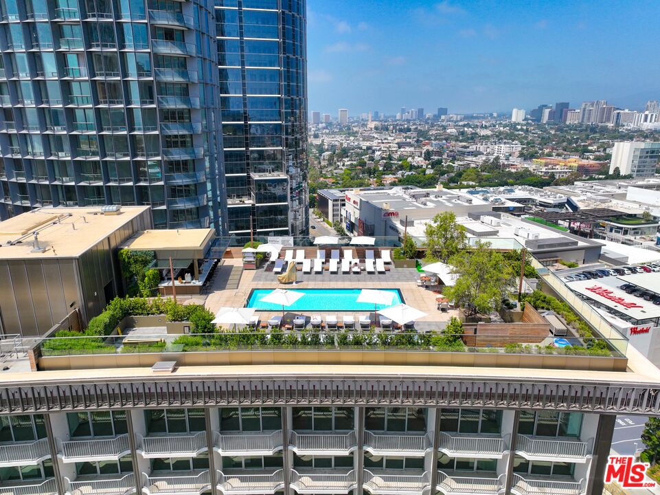 2025 Avenue Of The Stars, Unit 1202 Los Angeles, CA 90067 - Photo 16 of 20 a view of a city from a balcony