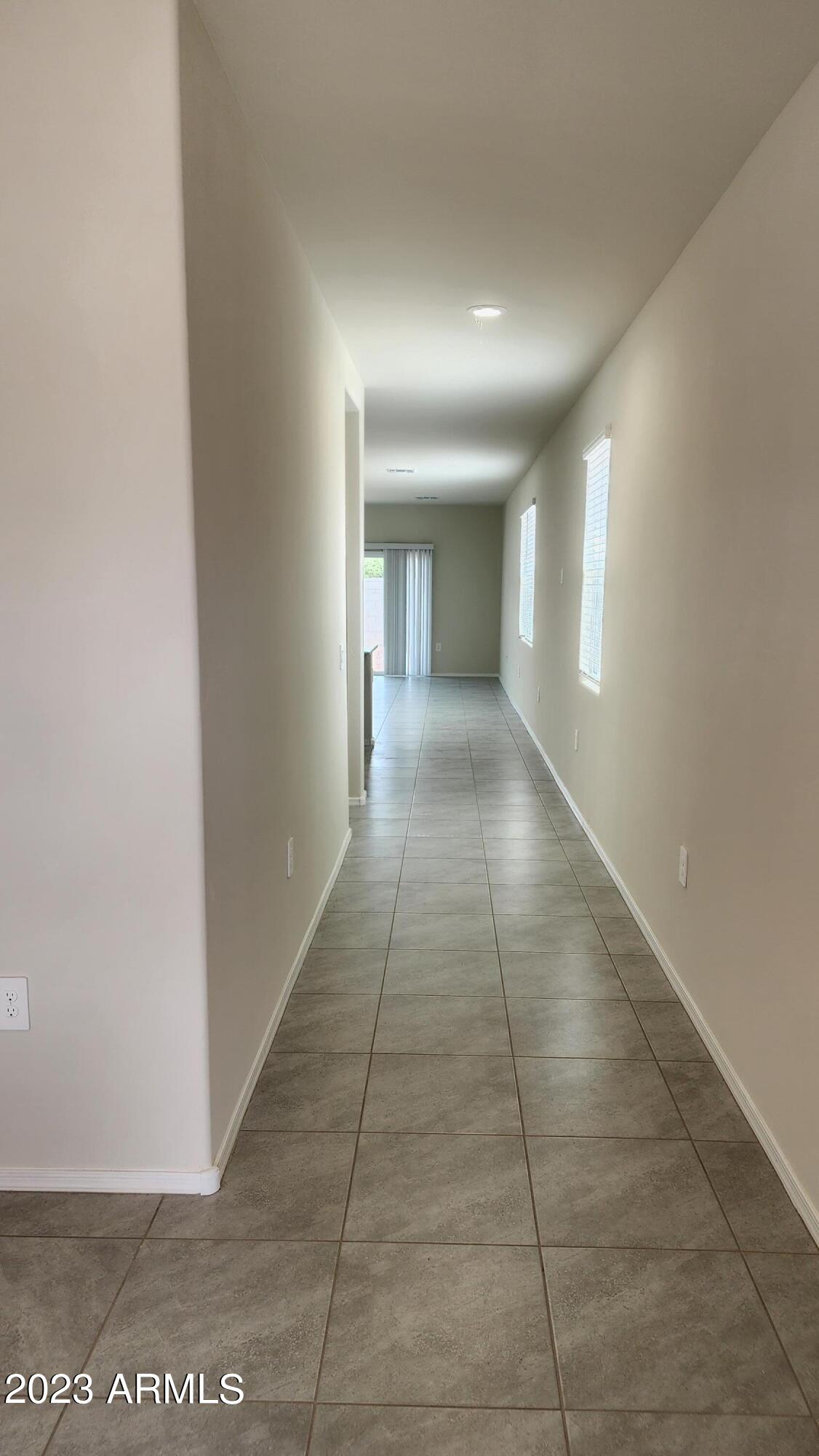 18045 North Conquistador Drive Maricopa, AZ 85138 - Photo 5 of 12 a view of a hallway