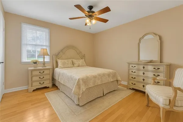 a bathroom with a sink a vanity and a shower