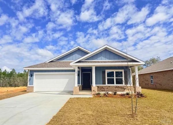 a front view of a house with yard
