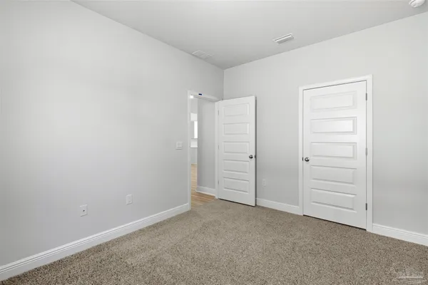 wooden floor and cabinet in a room