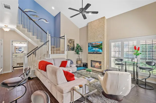 a living room with furniture or couch and a fireplace