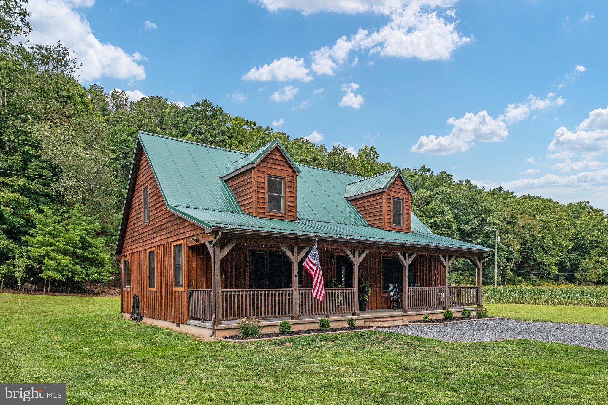 1396 Cullers Run Road Mathias, WV 26812 - Photo 44 of 79 Charming cabin nestled in lush greenery.