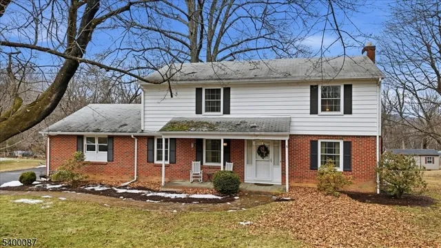 a front view of a house with swimming pool