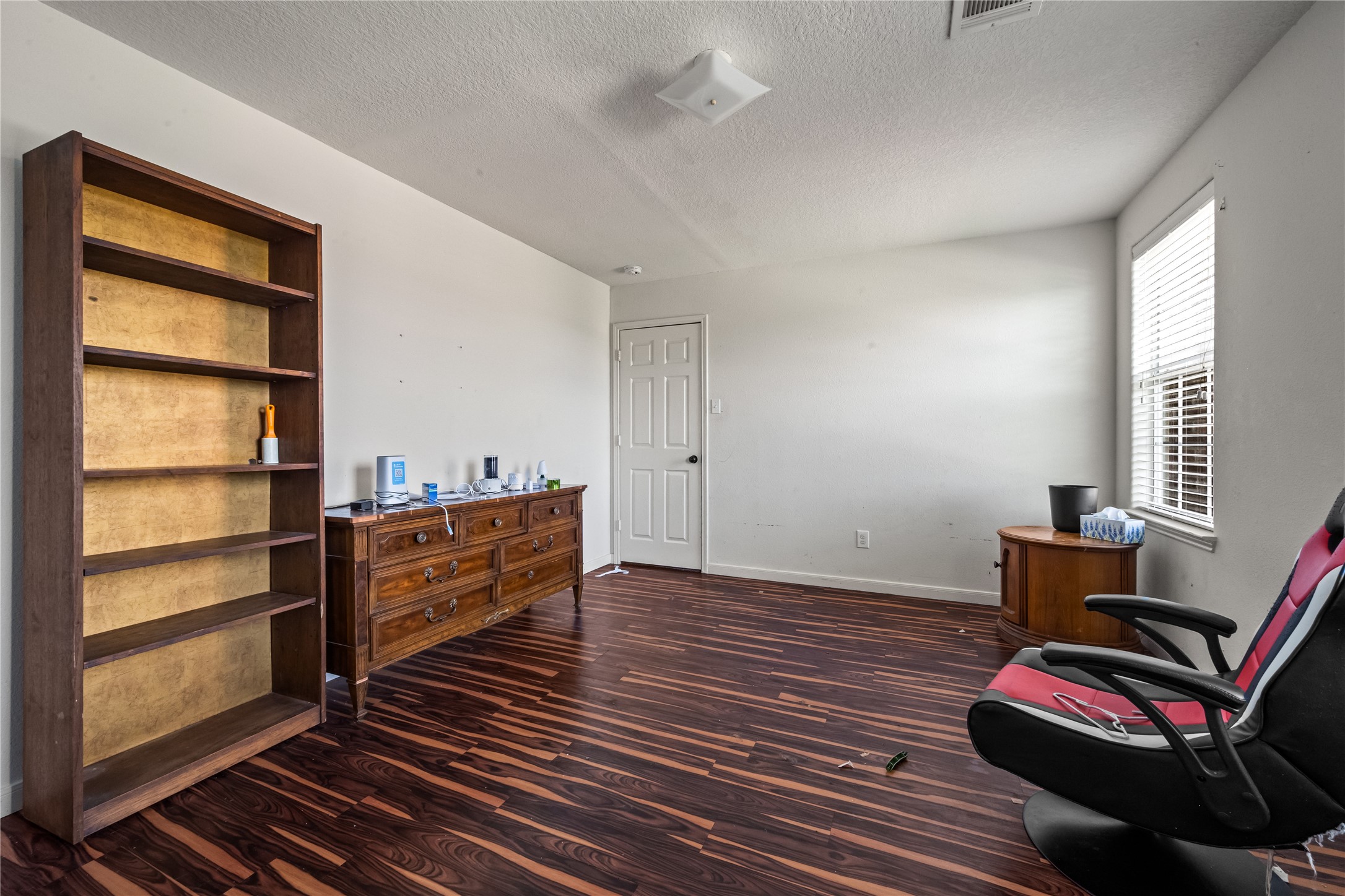 28832 San Bernard River Loop Spring, TX 77386 - Photo 31 of 50 a room with wooden floor and furniture
