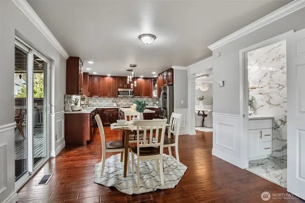 a bathroom with a sink and mirror