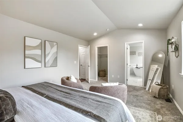 a bed room with a bed and windows