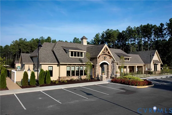 an aerial view of a house with swimming pool patio and mountain view