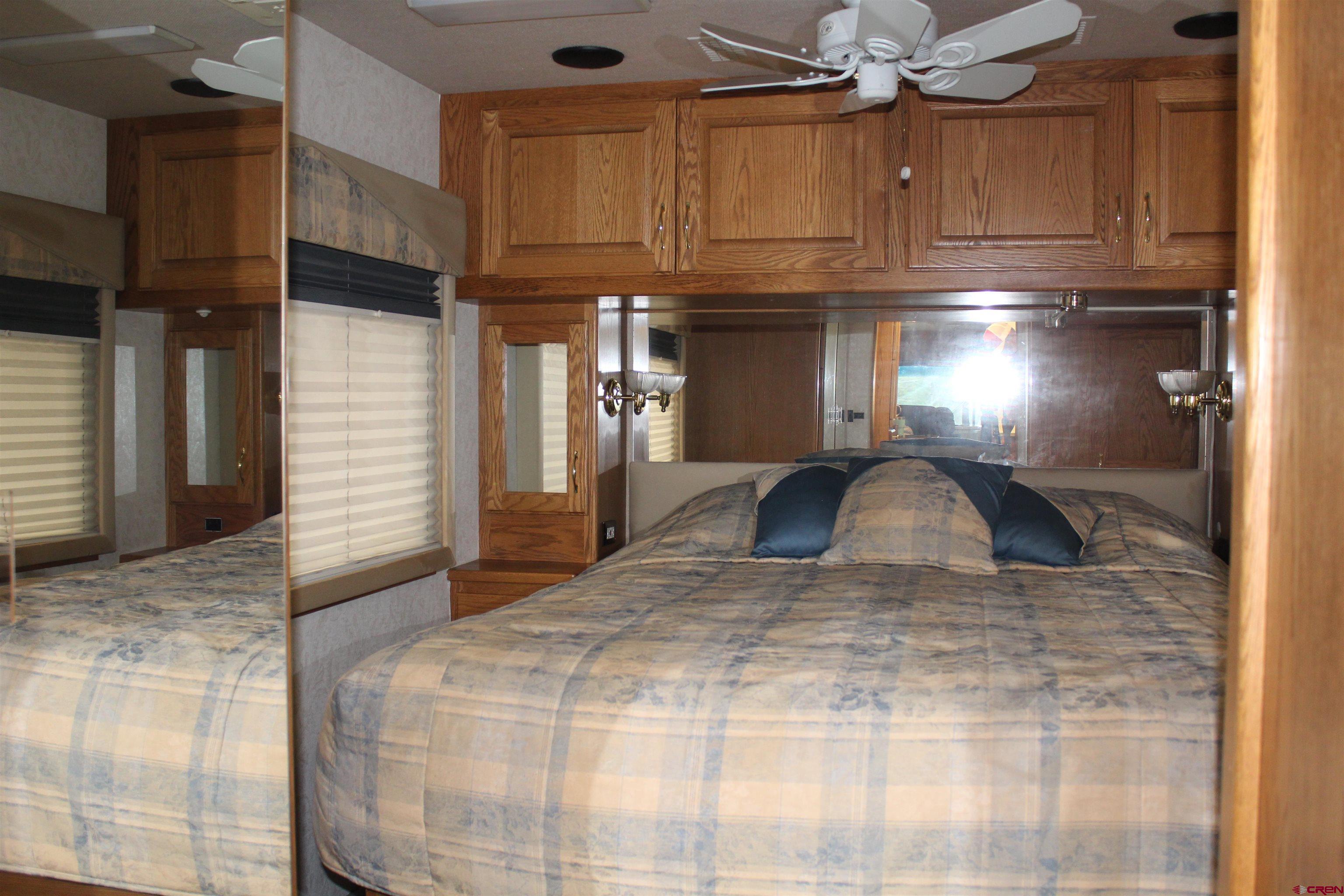 21051 Brimstone Road Cedaredge, CO 81413 - Photo 12 of 25 a view of a livingroom with furniture and staircase