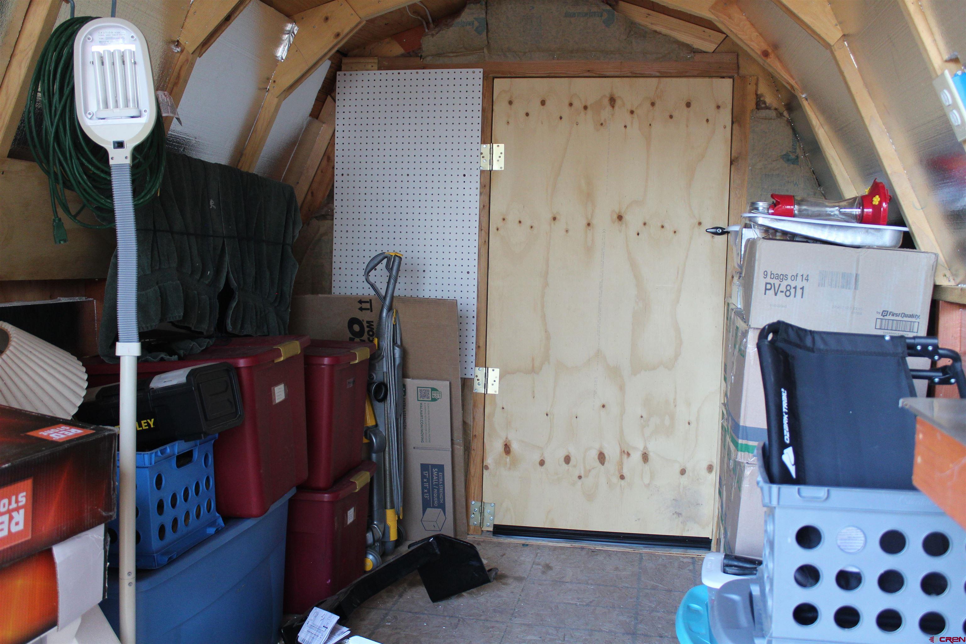 21051 Brimstone Road Cedaredge, CO 81413 - Photo 23 of 25 a view of storage and utility room