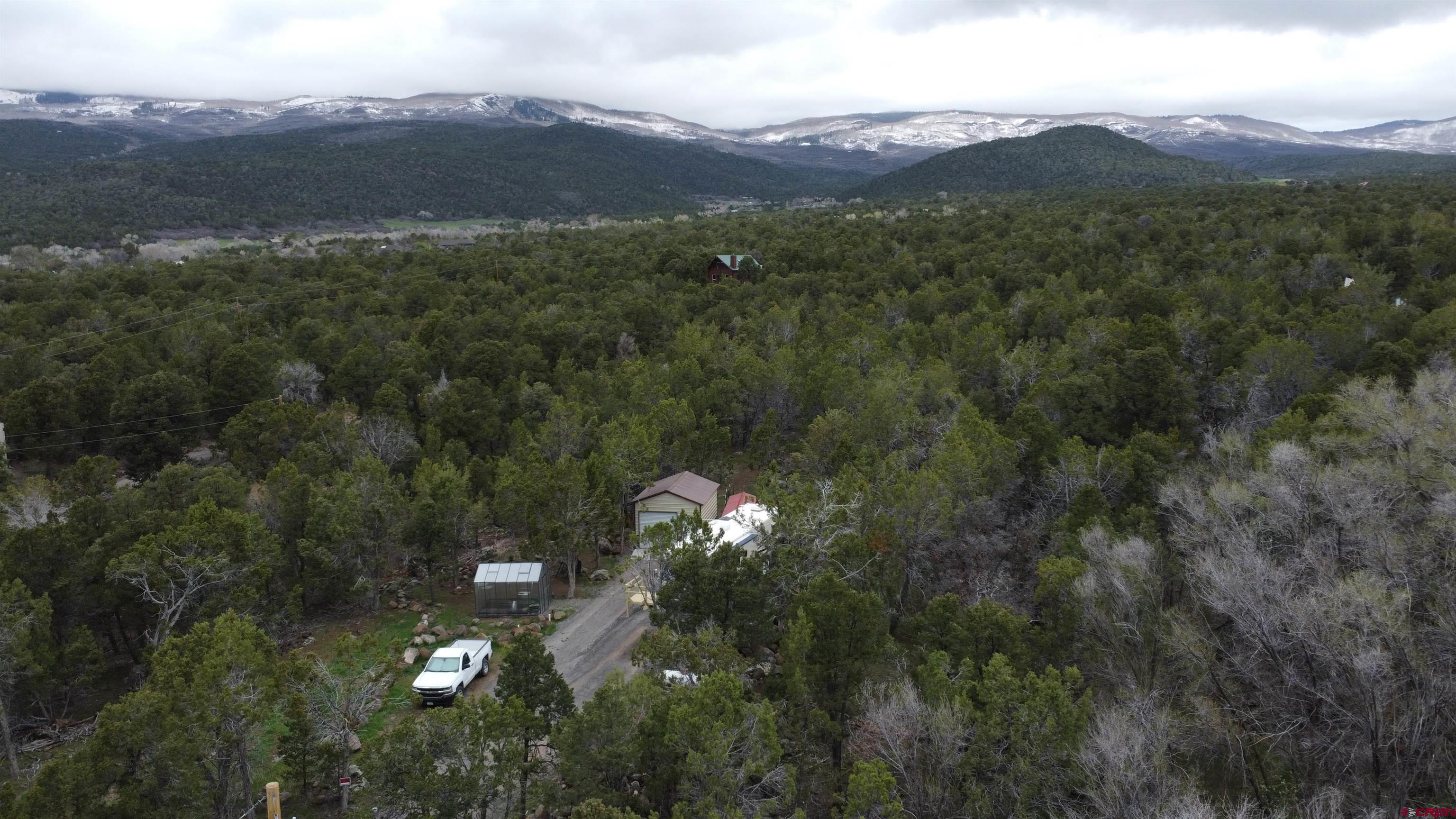 21051 Brimstone Road Cedaredge, CO 81413 - Photo 5 of 25 a view of city and mountain