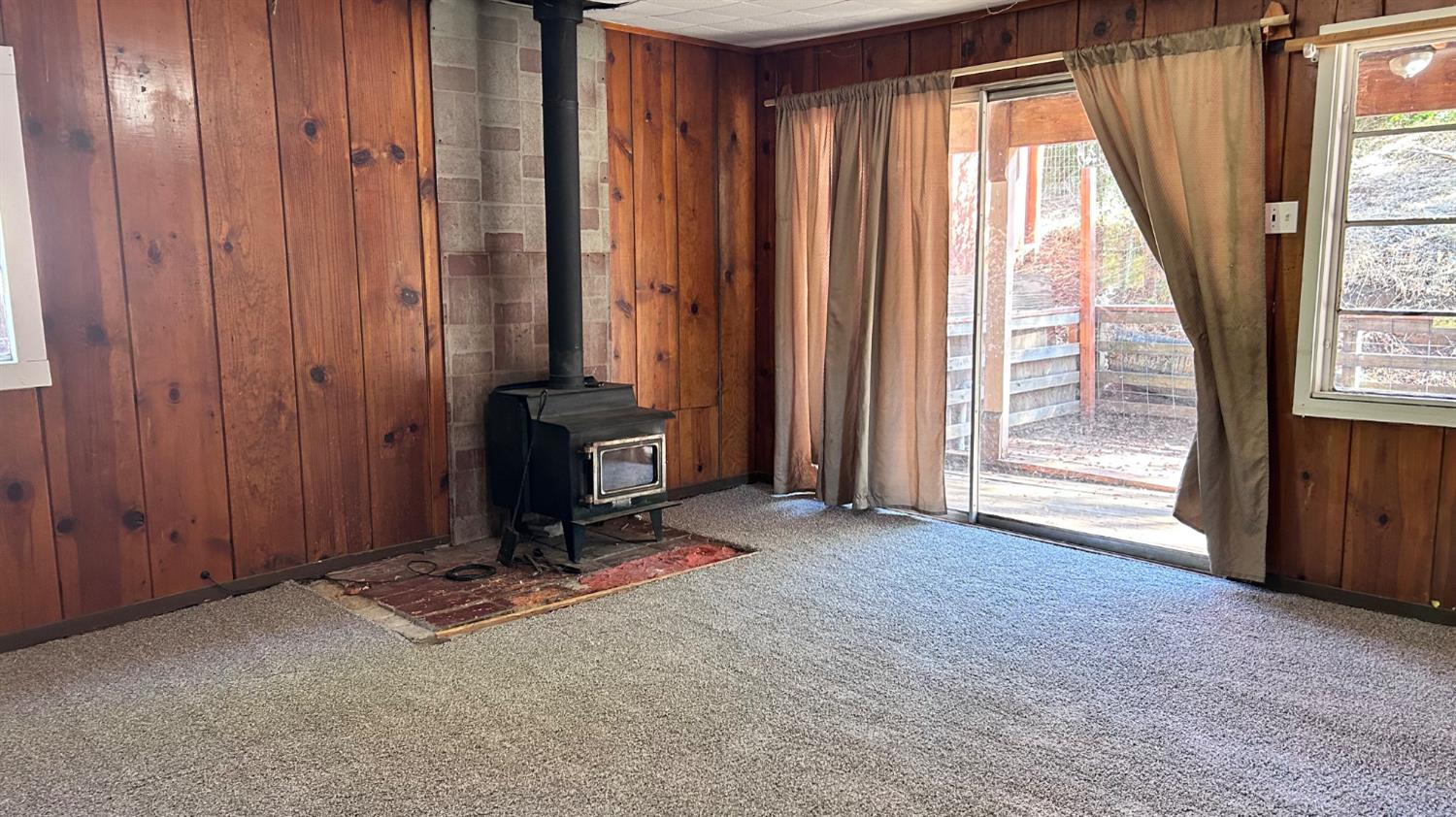 10210 East Murray Creek Road Mountain Ranch, CA 95246 - Photo 11 of 16 an empty room with windows