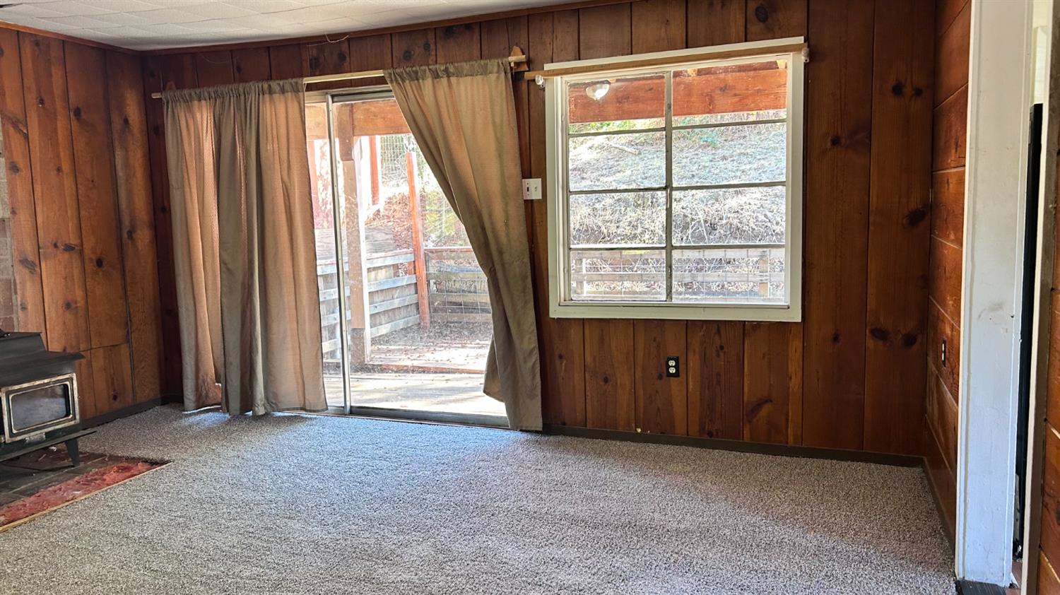 10210 East Murray Creek Road Mountain Ranch, CA 95246 - Photo 12 of 16 an empty room with windows and closet