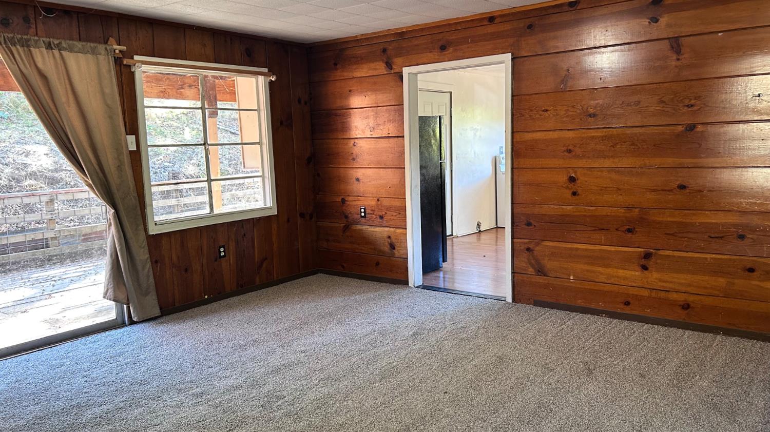 10210 East Murray Creek Road Mountain Ranch, CA 95246 - Photo 13 of 16 an empty room with windows and closet
