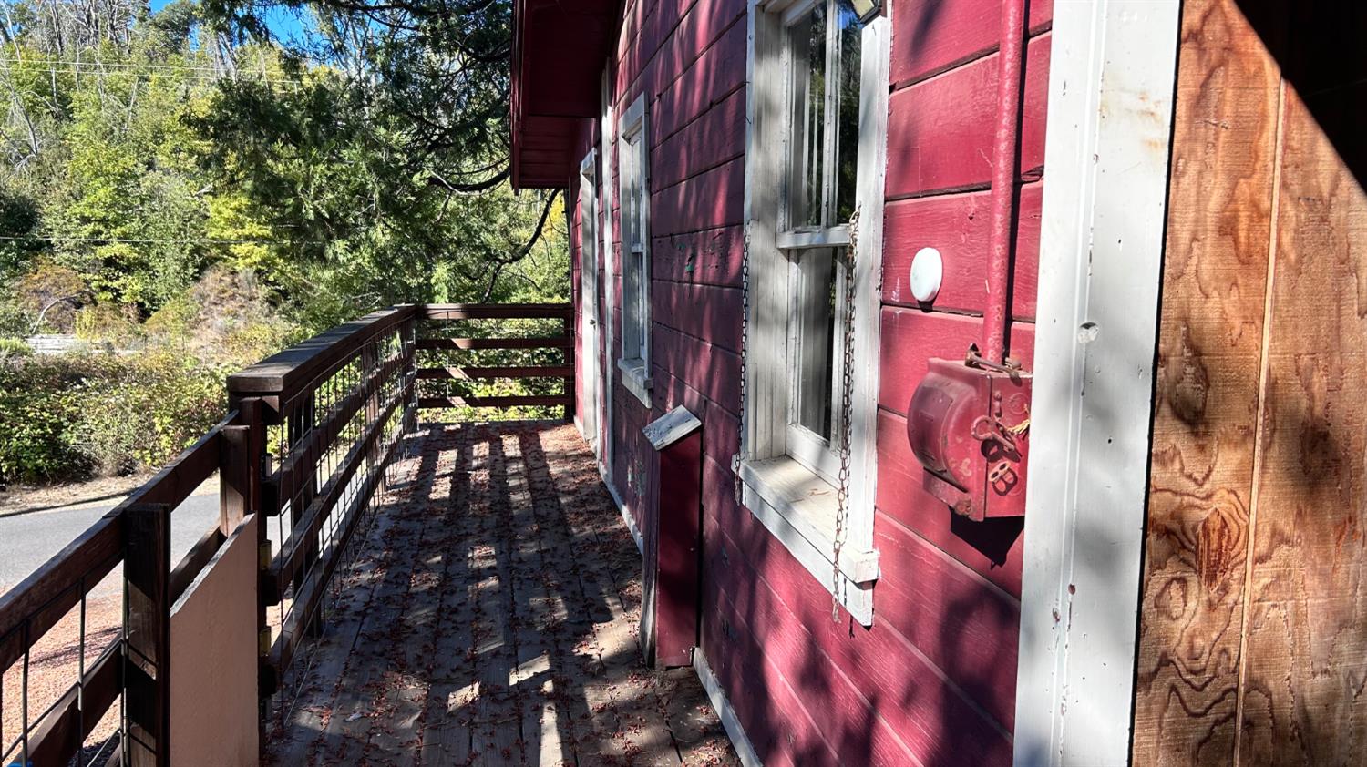10210 East Murray Creek Road Mountain Ranch, CA 95246 - Photo 7 of 16 a street sign under a large tree