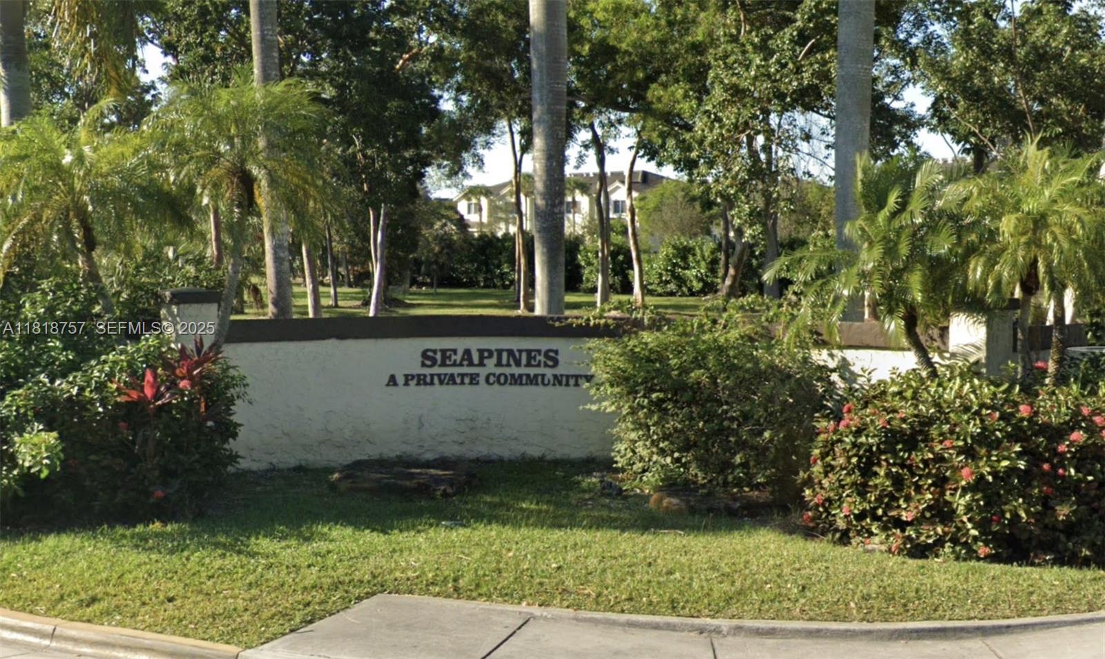 28133 Southwest 142nd Court Homestead, FL 33033 - Photo 2 of 13 a sign that is sitting on a brick wall