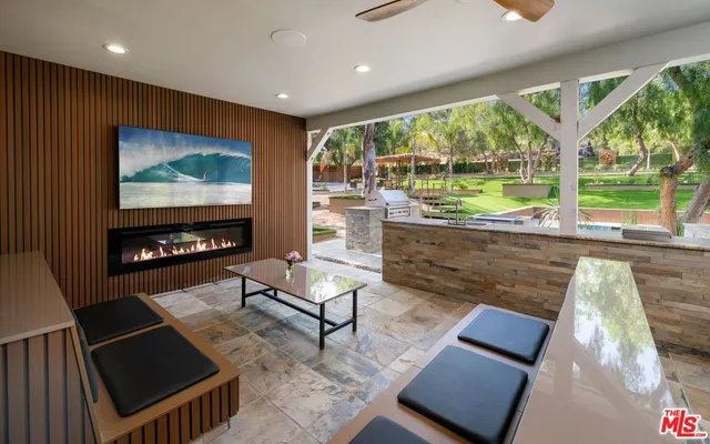 a living room with large window