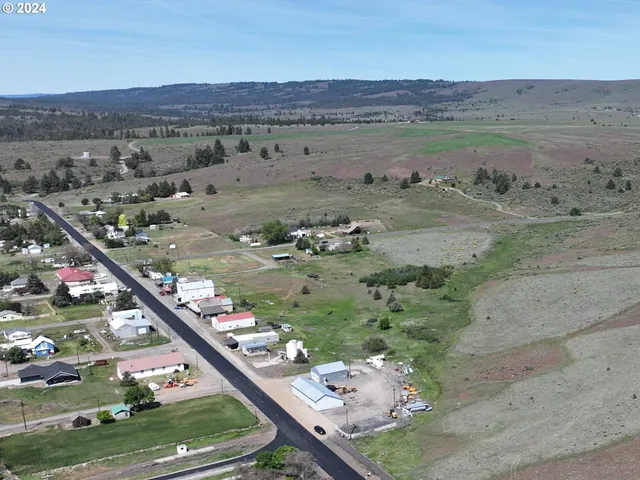 an aerial view of mountain with outdoor space