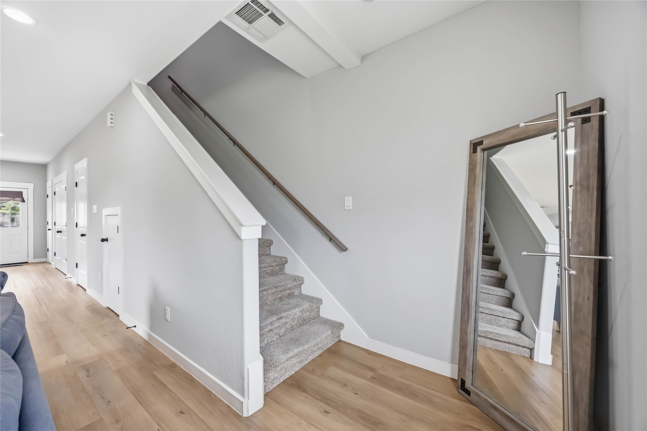 5403 Amy Street Houston, TX 77028 - Photo 14 of 28 a view of a hallway with staircase