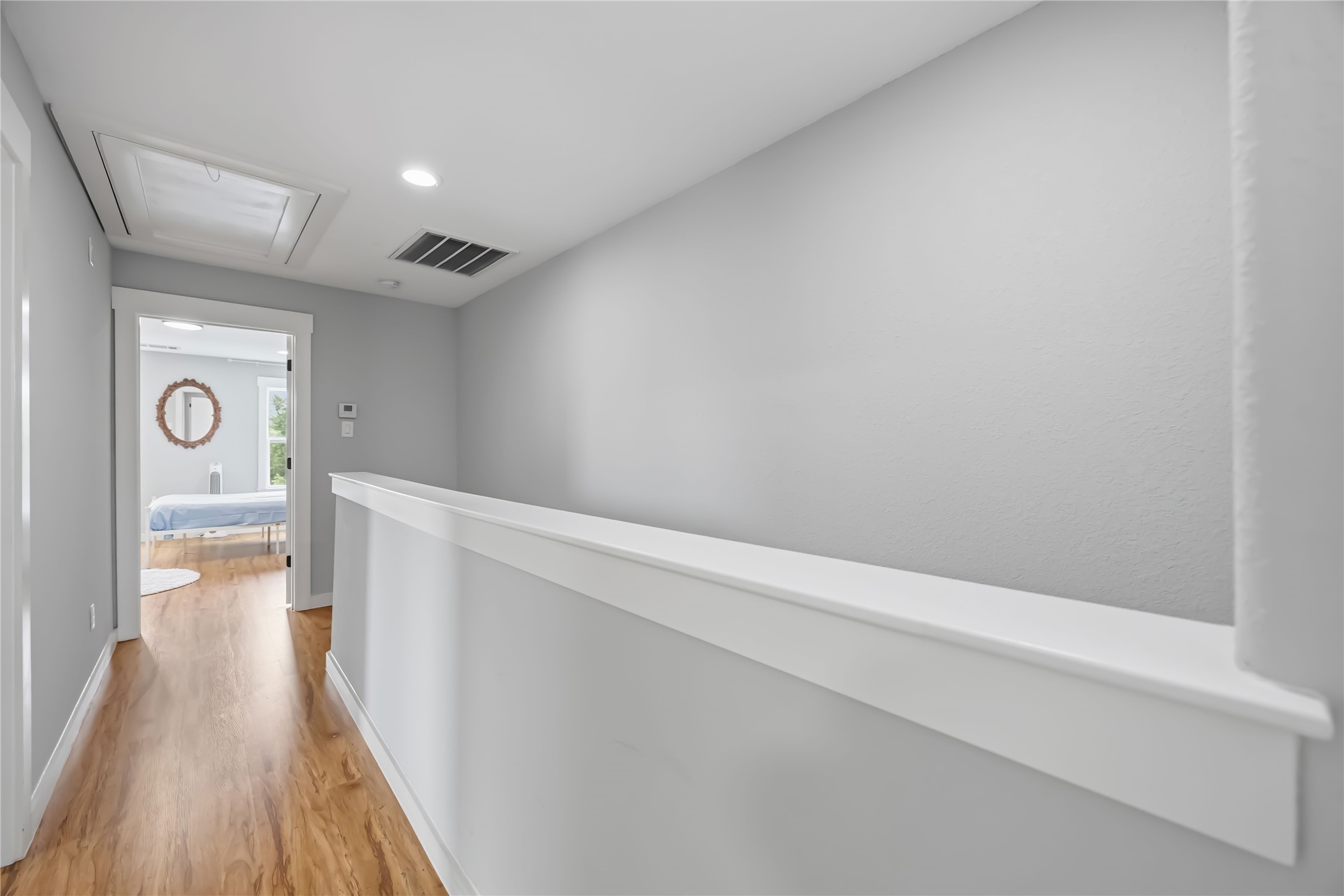 5403 Amy Street Houston, TX 77028 - Photo 15 of 28 a view of hallway with wooden floor