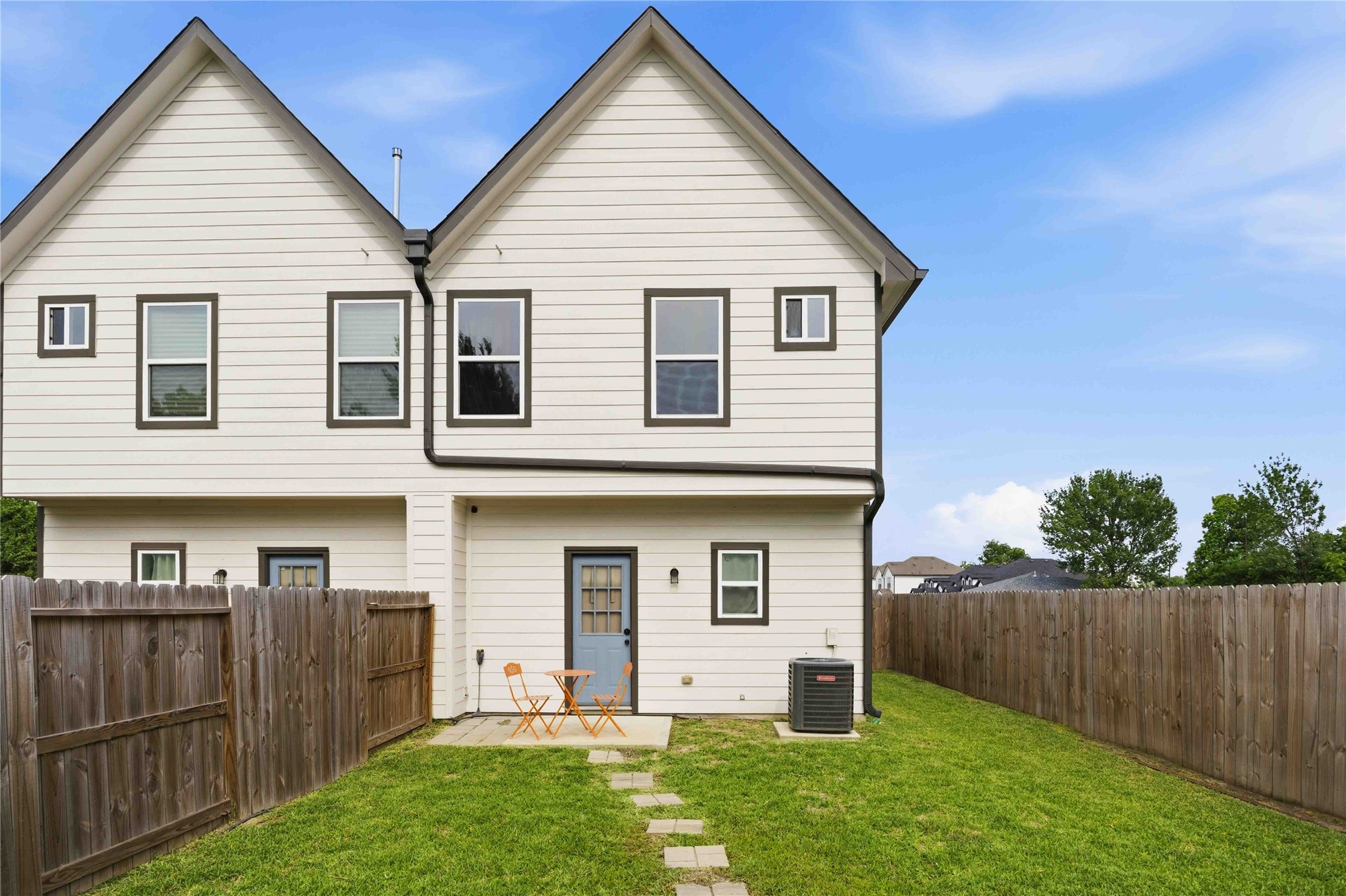 5403 Amy Street Houston, TX 77028 - Photo 25 of 28 a view of a house with a yard and wooden fence