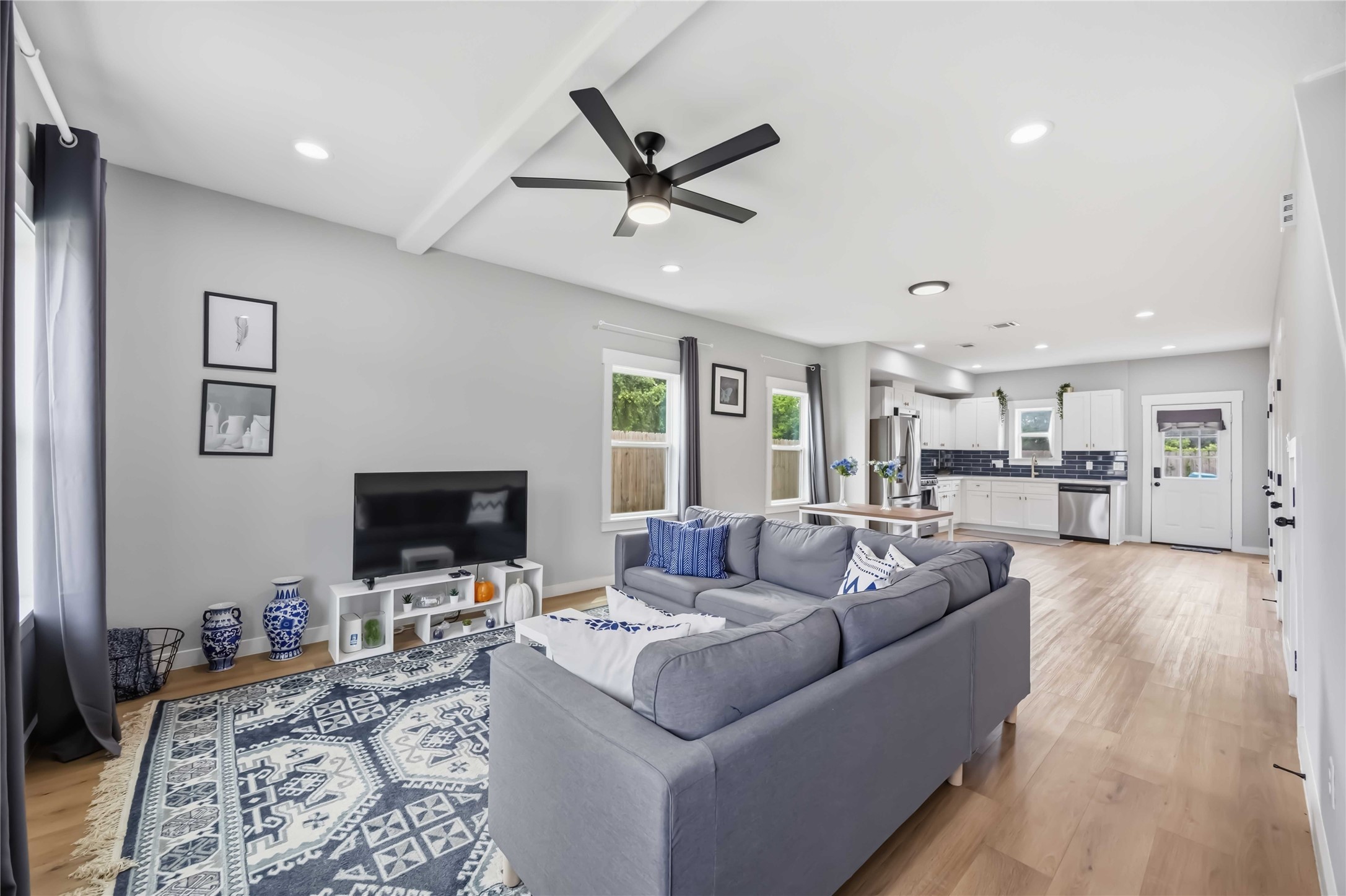 5403 Amy Street Houston, TX 77028 - Photo 5 of 28 a living room with furniture and a flat screen tv