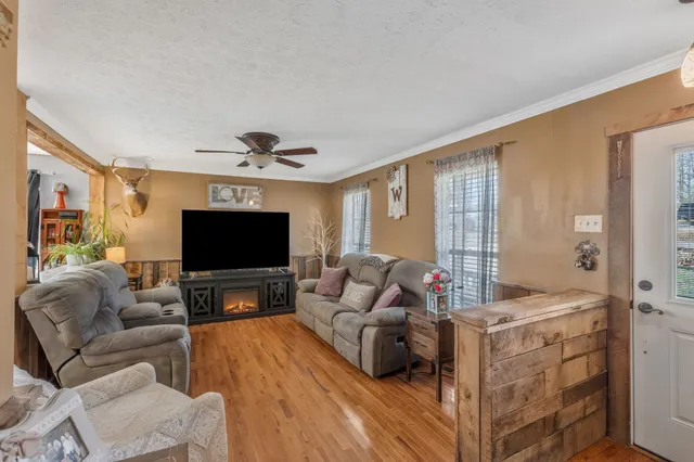 a kitchen with a sink and refrigerator