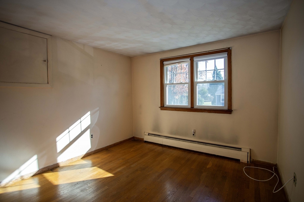 14 Sycamore Road Wakefield, MA 01880 - Photo 16 of 42 a view of an empty room with a window