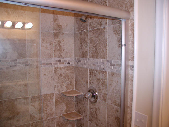 762 High Point Boulevard North, Unit D Delray Beach, FL 33445 - Photo 23 of 43 a bathroom with a shower