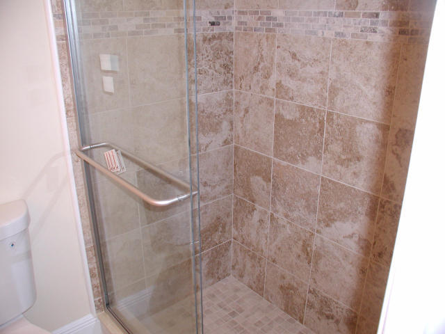 762 High Point Boulevard North, Unit D Delray Beach, FL 33445 - Photo 25 of 43 a bathroom with a shower