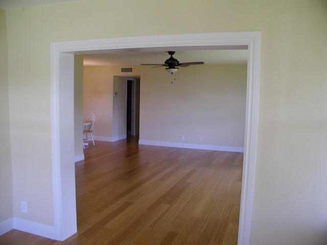 762 High Point Boulevard North, Unit D Delray Beach, FL 33445 - Photo 6 of 43 a view of a hallway with wooden floor