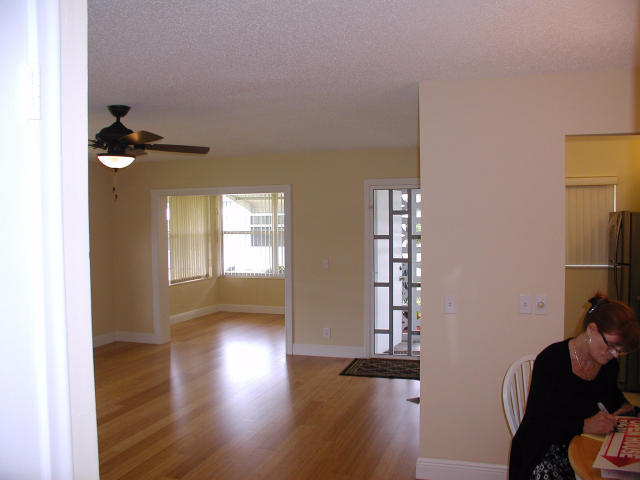 762 High Point Boulevard North, Unit D Delray Beach, FL 33445 - Photo 8 of 43 a view of entryway with wooden floor