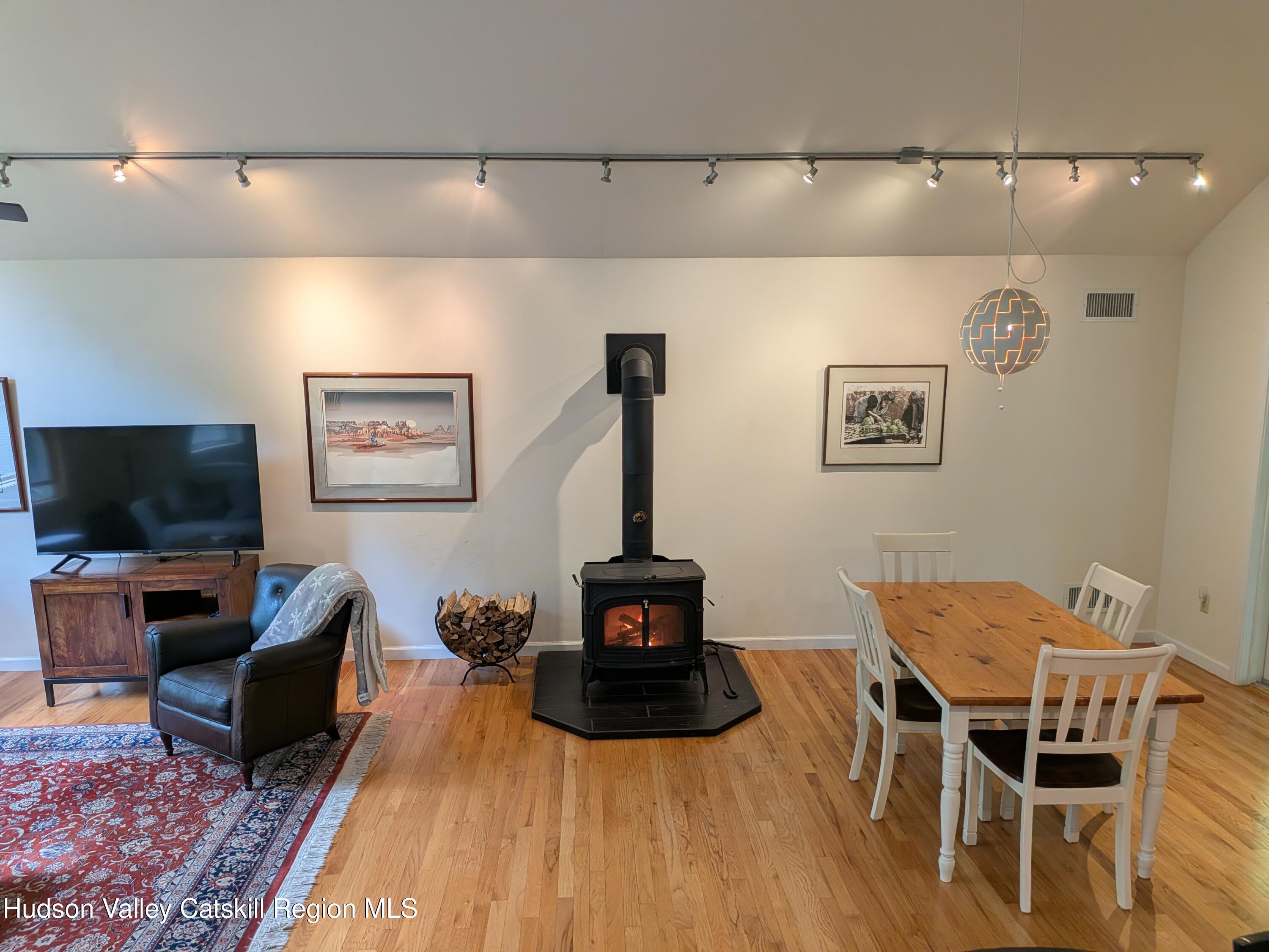 513 South Mountain Road Gardiner, NY 12525 - Photo 10 of 63 a living room with furniture and a flat screen tv