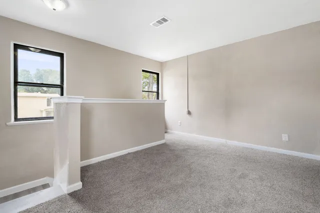 a view of an empty room with window