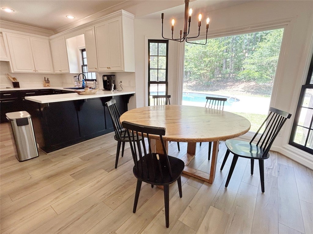 2004 Moores Mill Road Lanett, AL 36863 - Photo 23 of 50 This bright kitchen with a breakfast bar provides ample space for entertaining and everyday living.