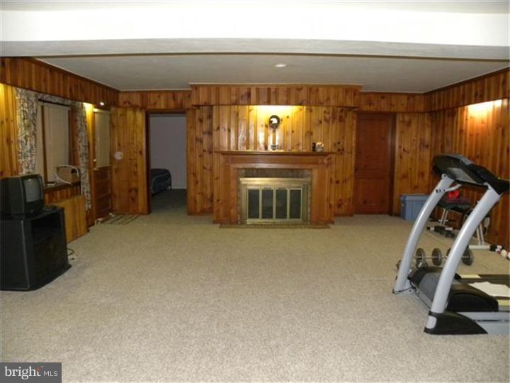 319 Southcroft Road Springfield, PA 19064 - Photo 14 of 24 a view of a room with gym equipment