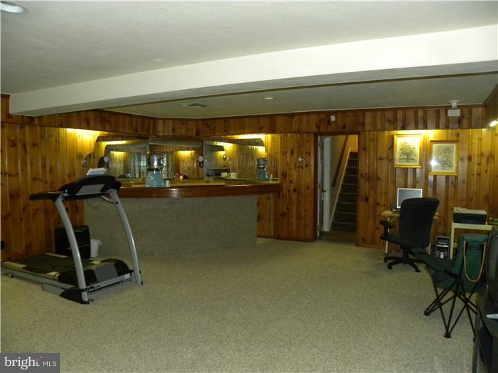 319 Southcroft Road Springfield, PA 19064 - Photo 15 of 24 a view of a room with gym equipment